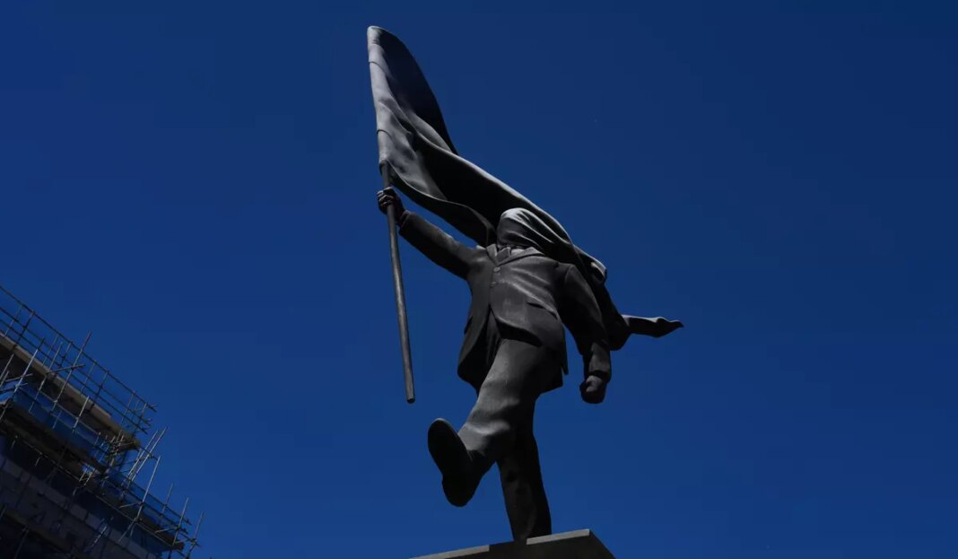 APTOPIX Britain Banksy 67744 c0 327 7853 4907 s1200x700.jpg