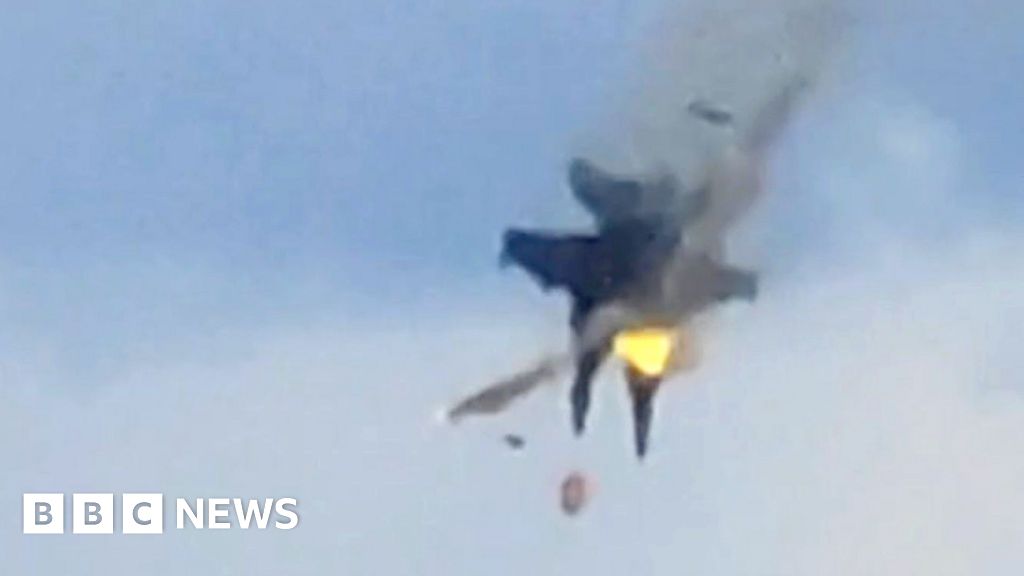 Moment two fighter jets collide mid-air during US air show