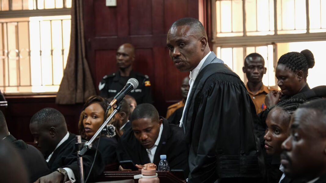 Uganda court charges lawyer for jailed Ugandan opposition leader with concealing treason